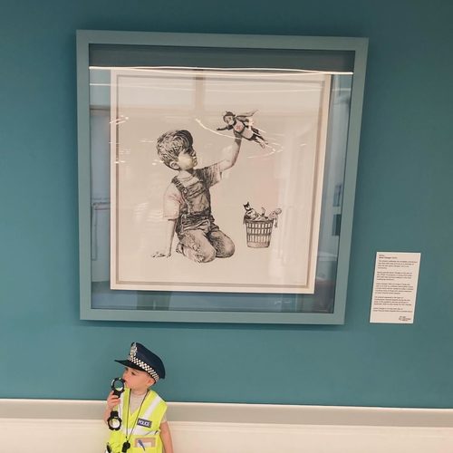 Freddie dressed as a police officer at Great Ormond Street
